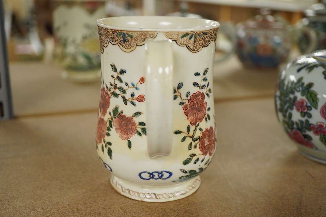 A Bow polychrome mug - 11.5cm high and a Bow prunus sprigged coffee can, c.1760-70